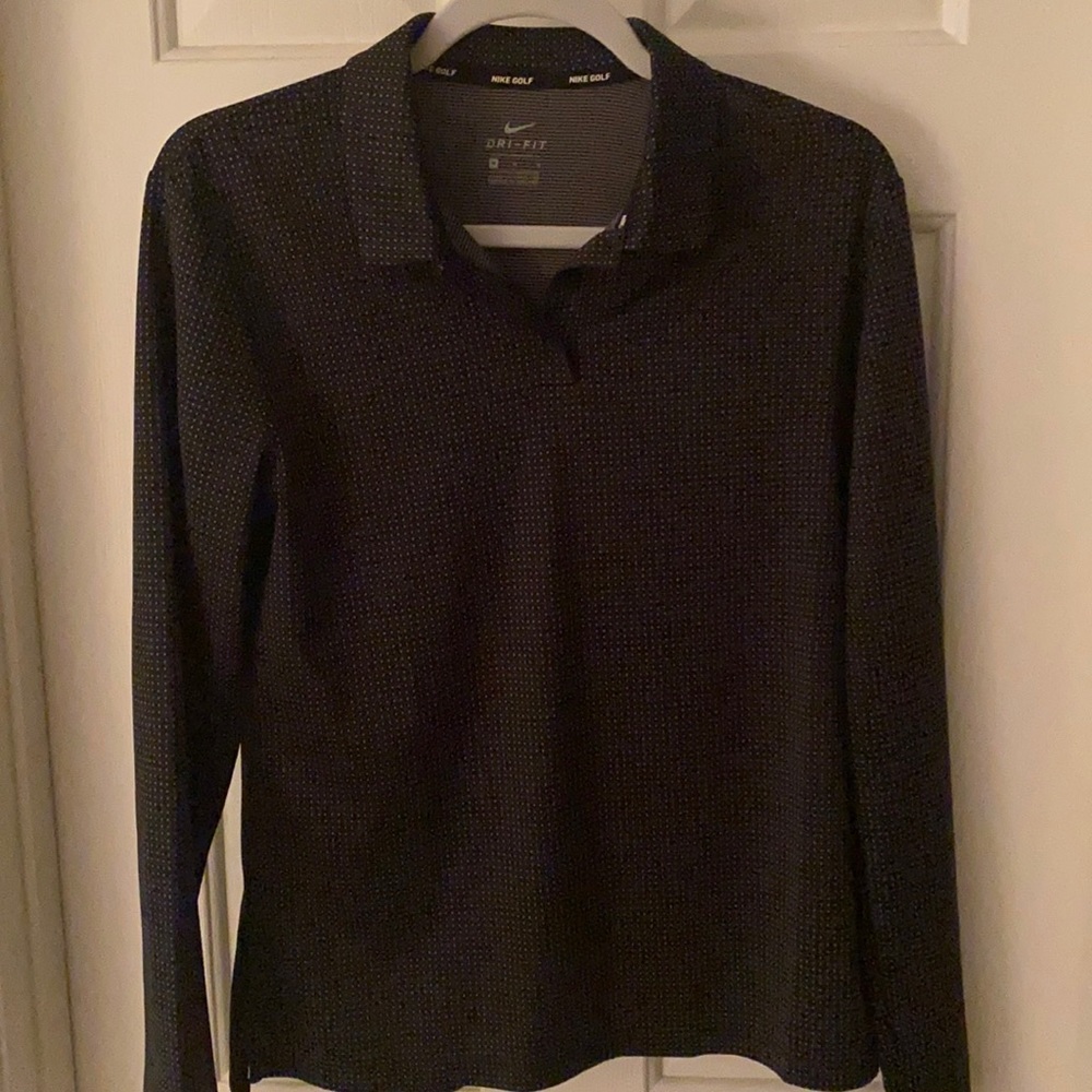 Nike golf shirt.